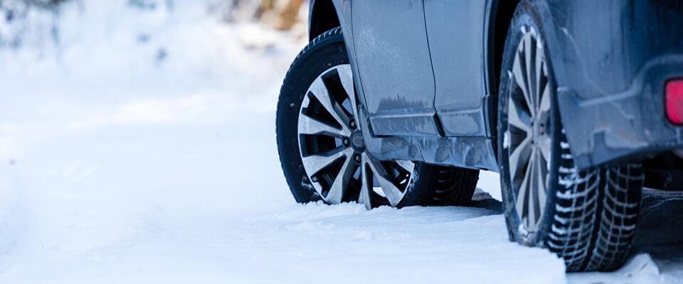 Car driving in thick snow