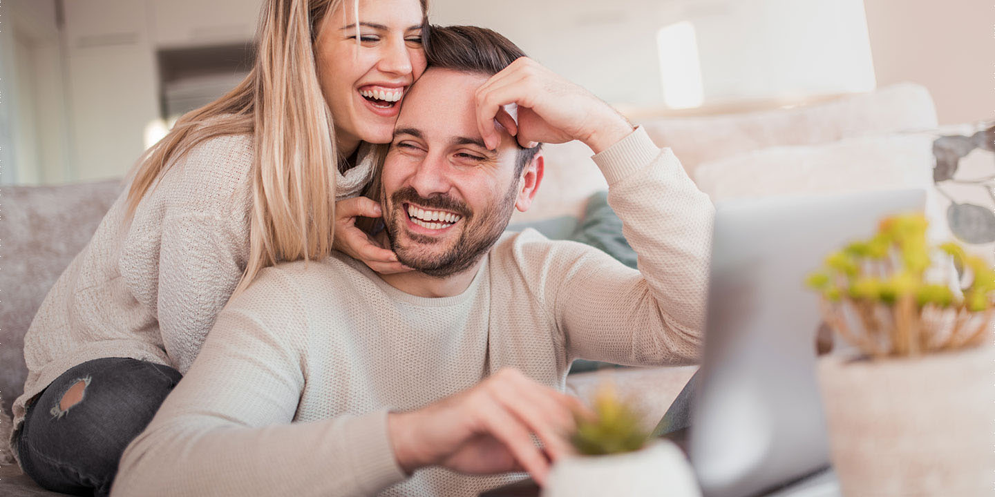 Happy couple on couch