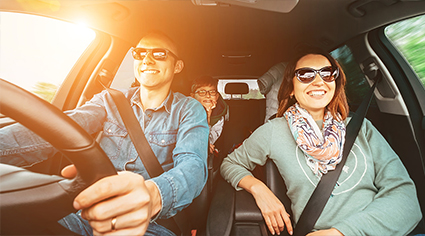 Family driving in their car