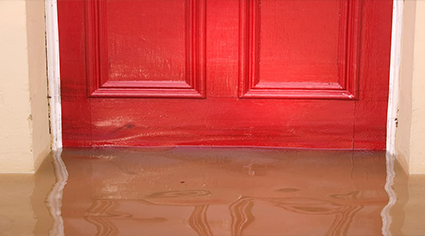 Flood waters at a front door